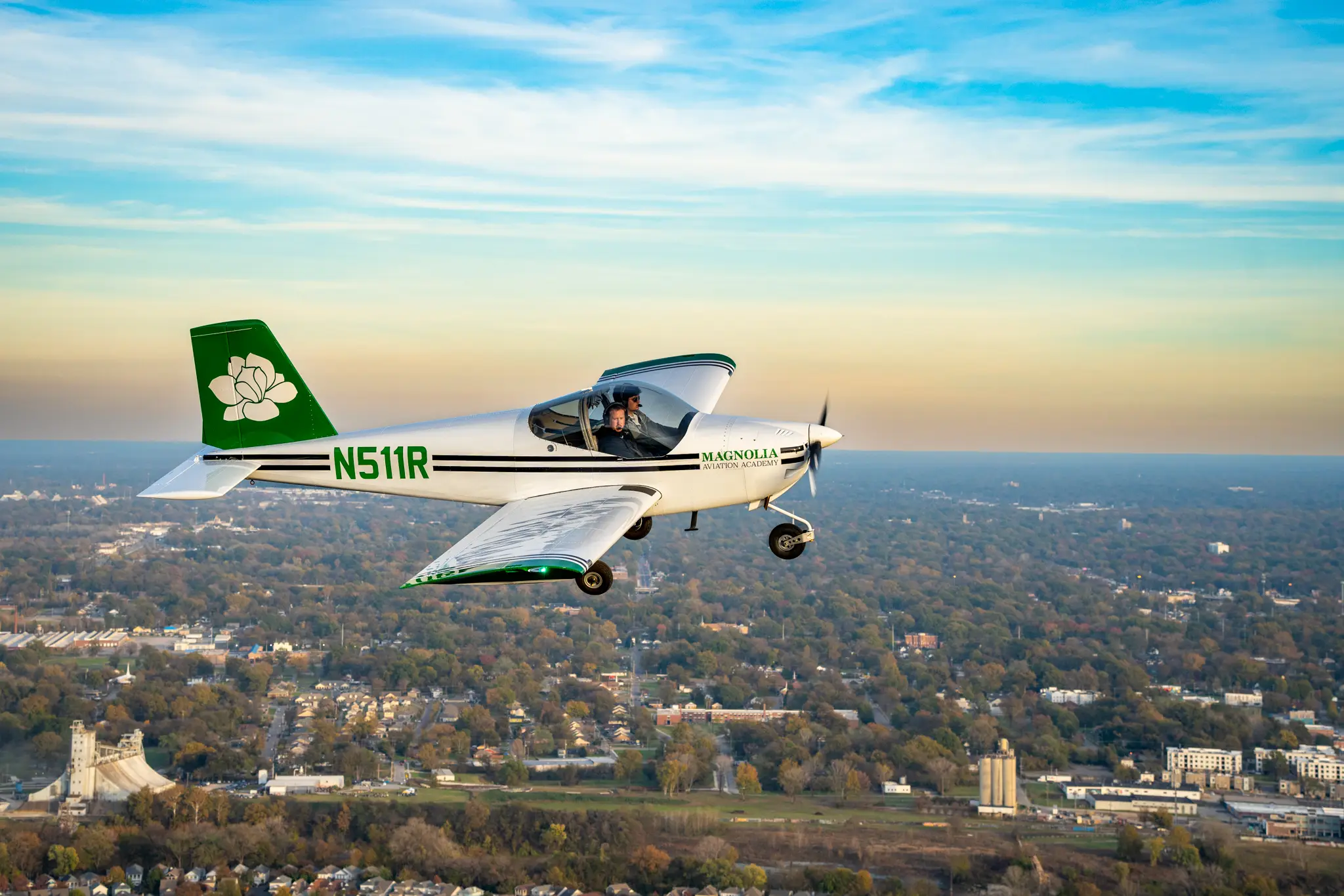 Magnolia Aviation Academy plane shot from side while flying