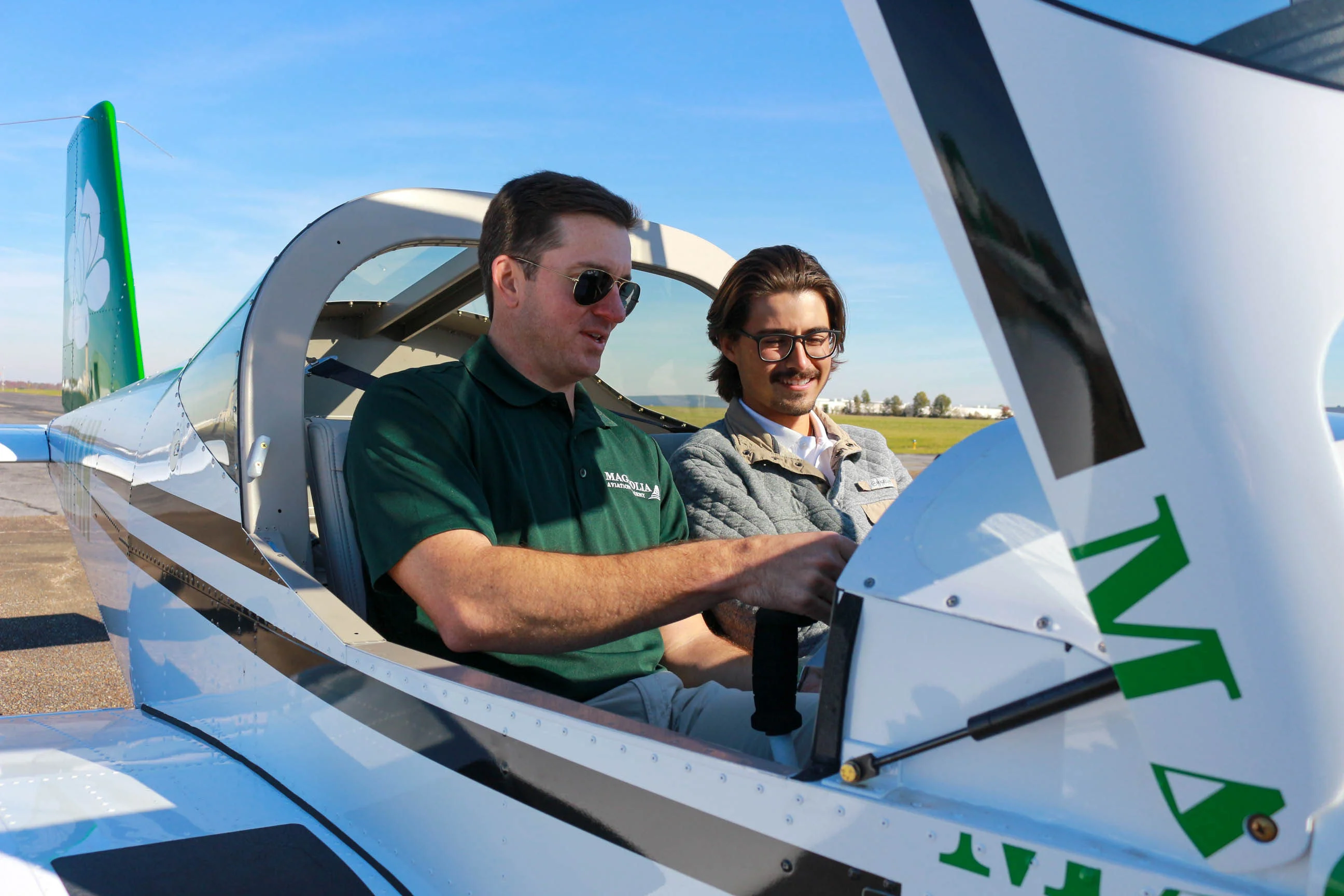 Instructor and student inside a cockpit at Magnolia Aviation Academy